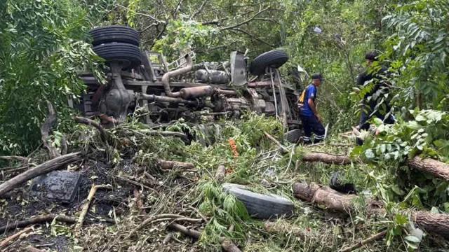 Truck Carrying Asphalt Plunges into Ravine in Lamphun